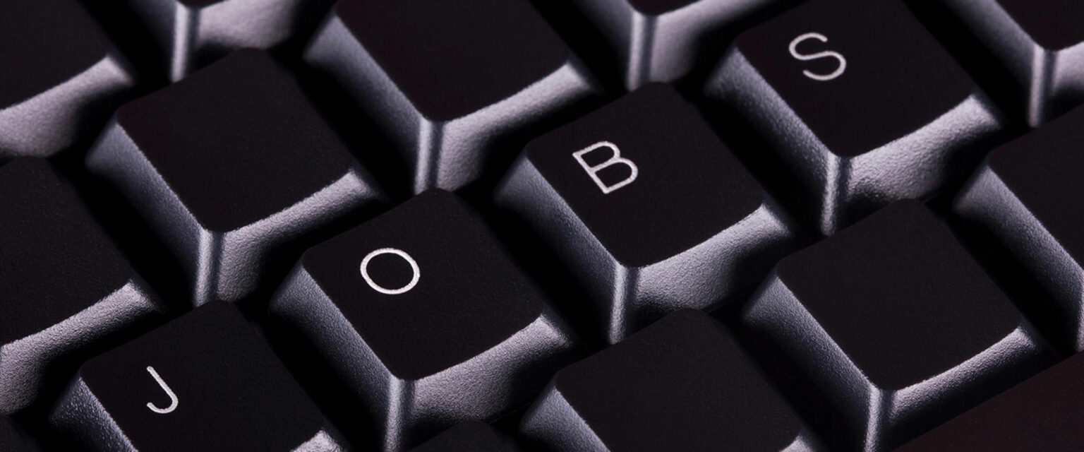 Computertastatur mit Tasten welche den Namen Jobs ergeben.